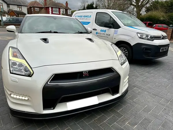 Nissan GT-R with the Mass Vehicle Security van behind it, fitted at the customer home