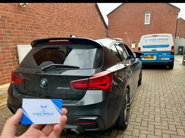 BMW M140i with the Mass Vehicle Security van on a mobile installation